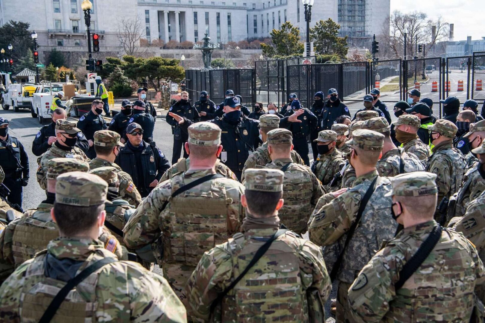 Capitol Police and National Guard troops conduct a security briefing on March 4, 2021. A leading Senate Democrat has raised concerns about a provision in the Capitol security bill that would house a proposed rapid response force within the D.C. National Guard. 