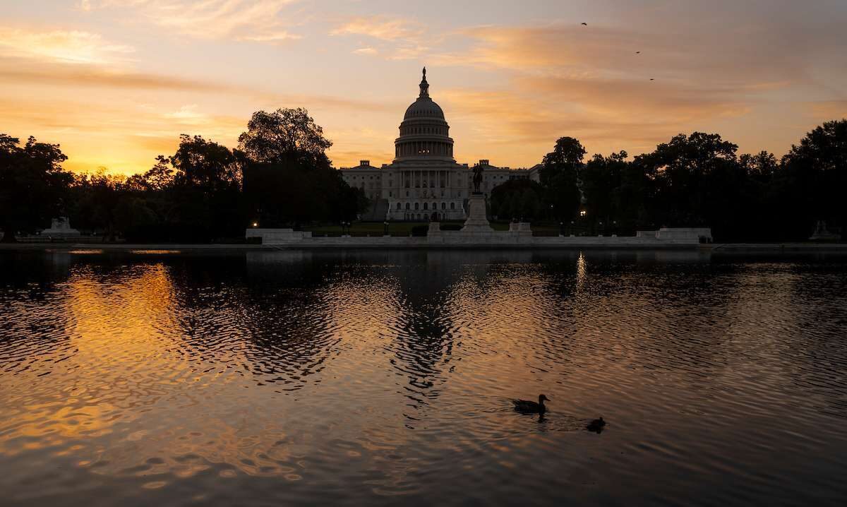 The Capitol dome is seen at sunrise in May. 