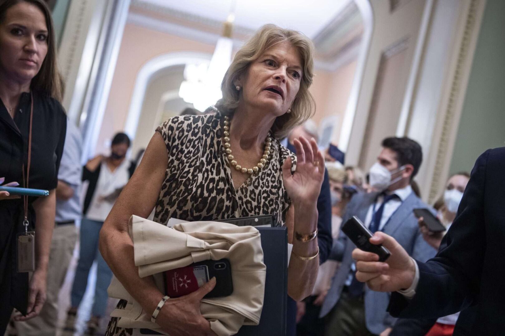 Sen. Lisa Murkowski is seen after a news conference announcing an agreement on an infrastructure bill in the Capitol.