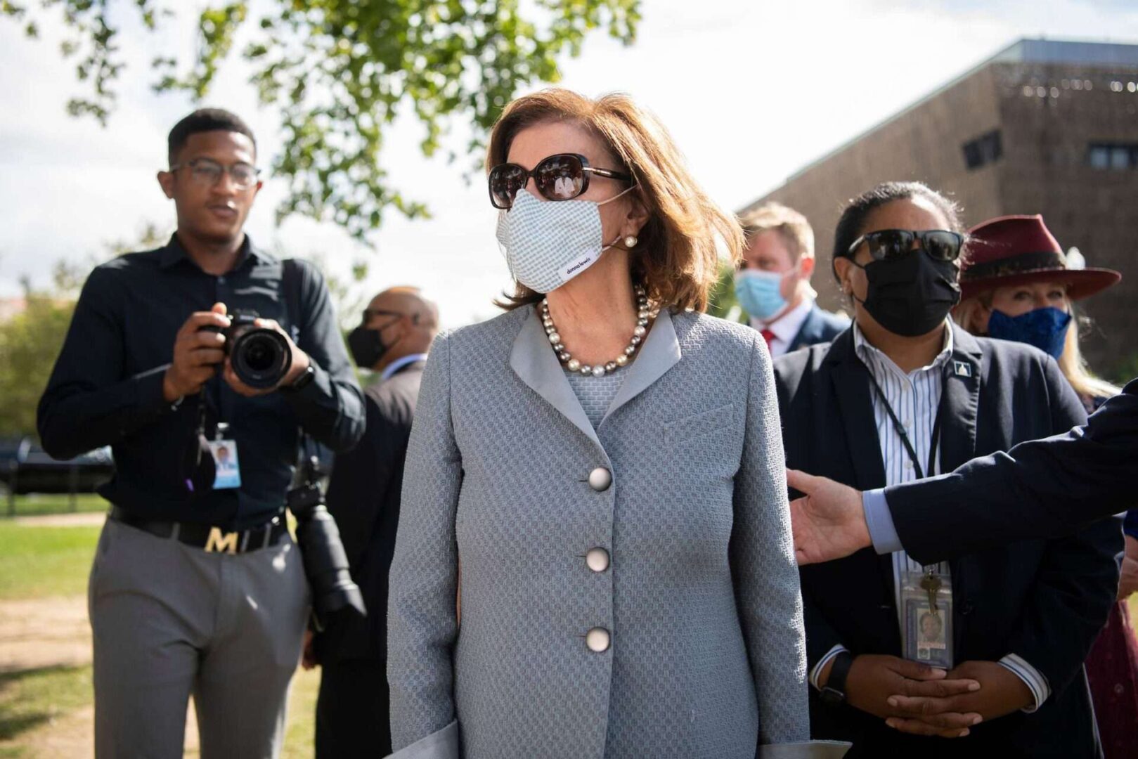 Speaker Nancy Pelosi, D-Calif., arrives Tuesday to speak at the "In America: Remember" art installation on the National Mall.