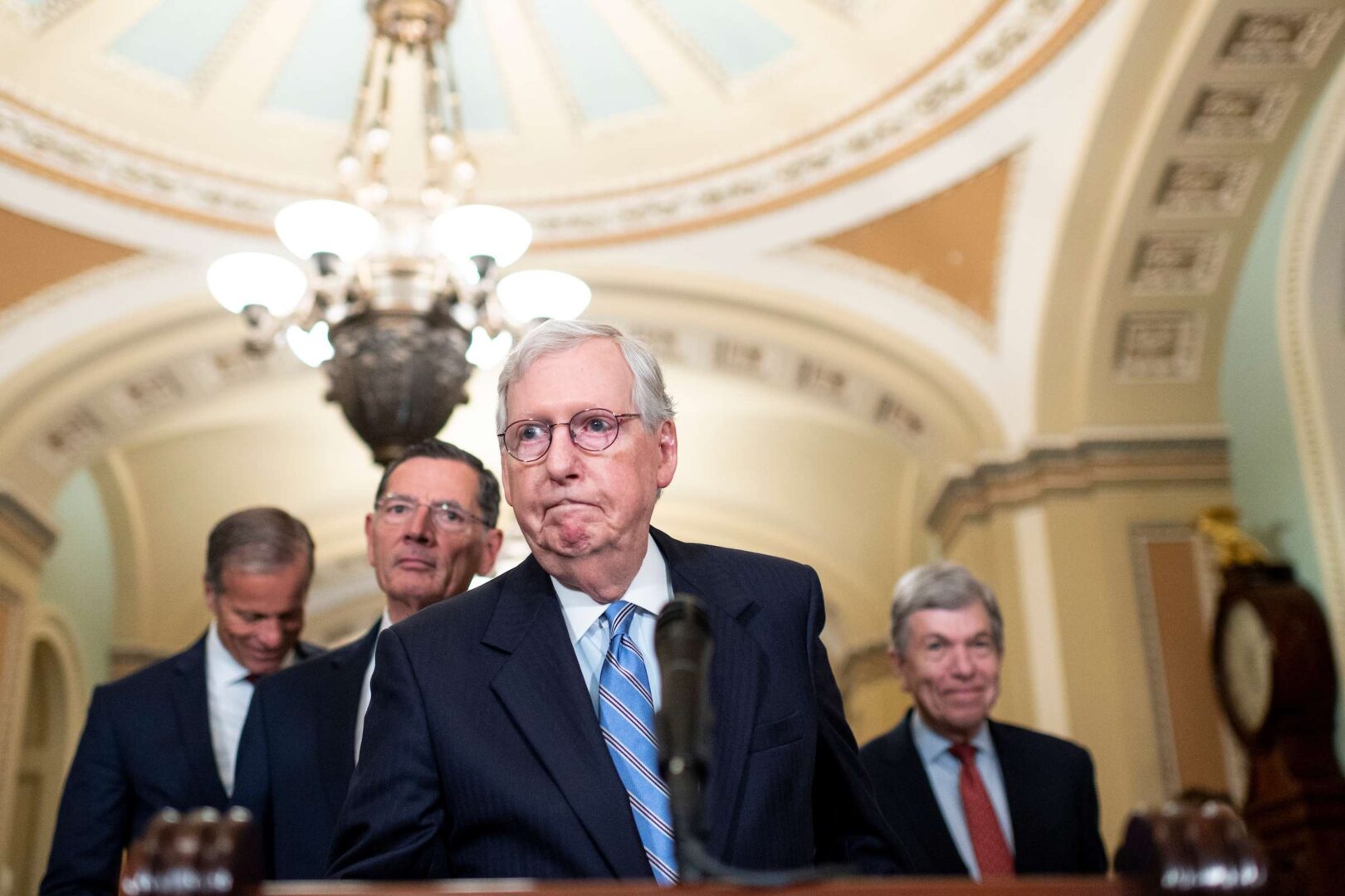 Senate Minority Leader Mitch McConnell, R-Ky., flanked from left by Sens. John Thune, R-S.D., John Barrasso, R-Wyo., and Roy Blunt, R-Mo., arrive at the podium for their press conference in the Capitol on Oct. 5. 