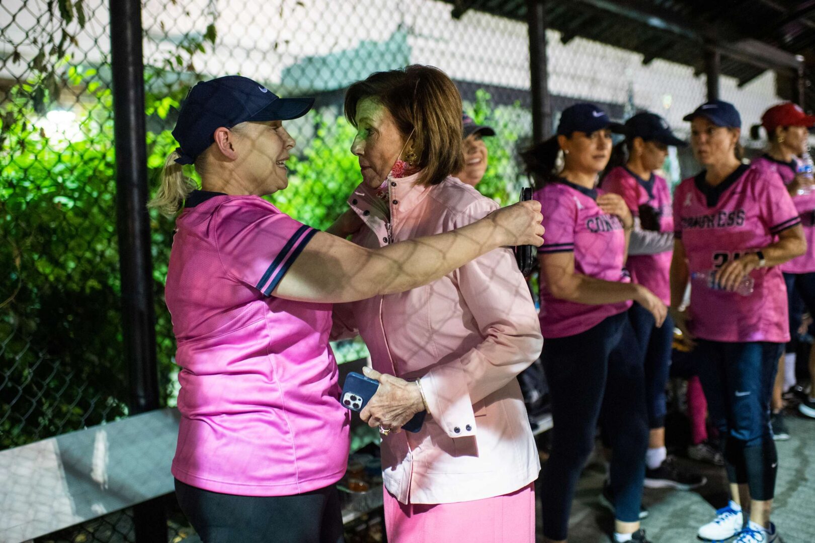 Speaker Nancy Pelosi, right, greets Sen. Kirsten Gillibrand at the Congressional Women's Softball game in October. Gillibrand said Wednesday the House paid leave plan was an "extremely strong" proposal and a "great base" to build on in future legislation.
