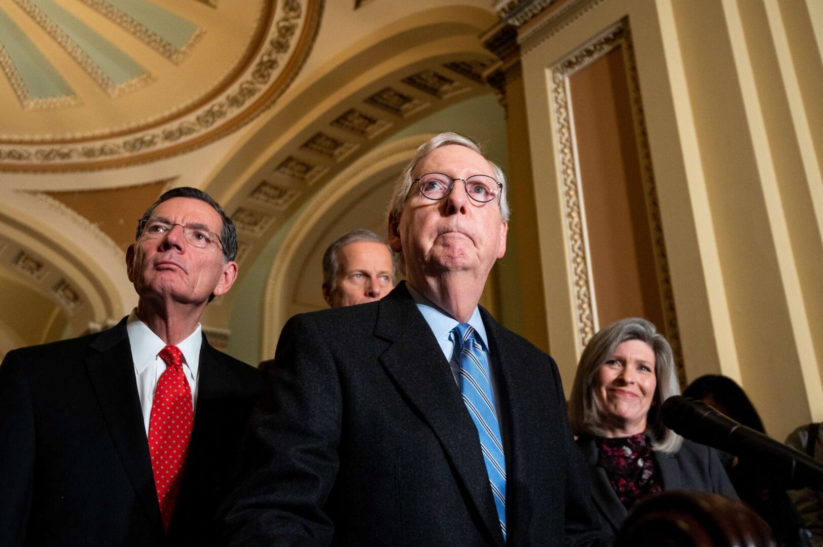 Senate Minority Leader Mitch McConnell speaks during the a news conference in the Capitol on Tuesday, Nov. 30, 2021. Behind McConnell, from left, are Sens. John Barrasso, R-Wyo., John Thune, R-S.D., and Joni Ernst, R-Iowa.