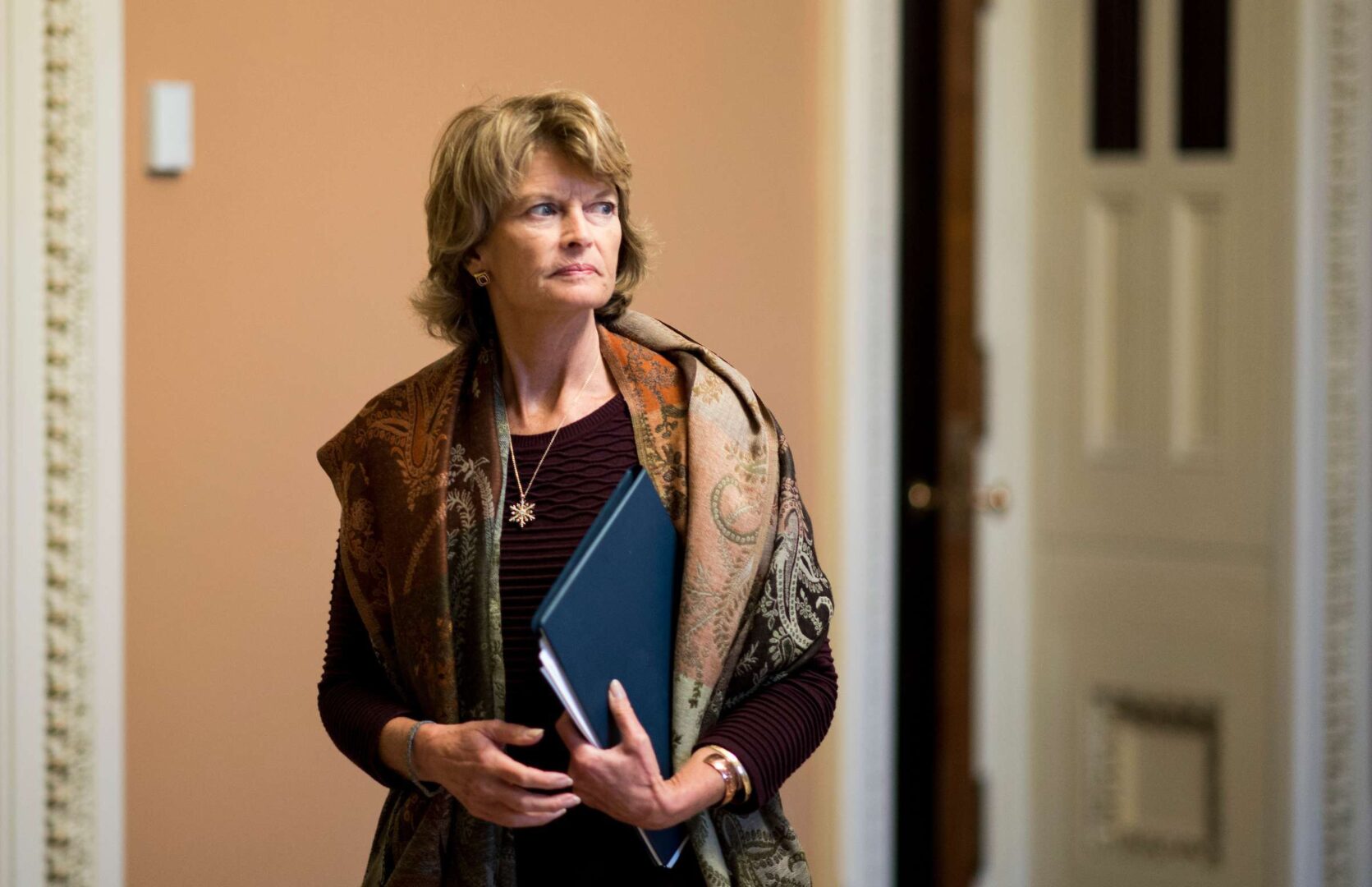 A new primary process in Alaska that sends the four top vote-getters on to the general election could benefit Sen. Lisa Murkowski as she faces Republican backlash for voting to convict former President Donald Trump at his 2021 impeachment trial.