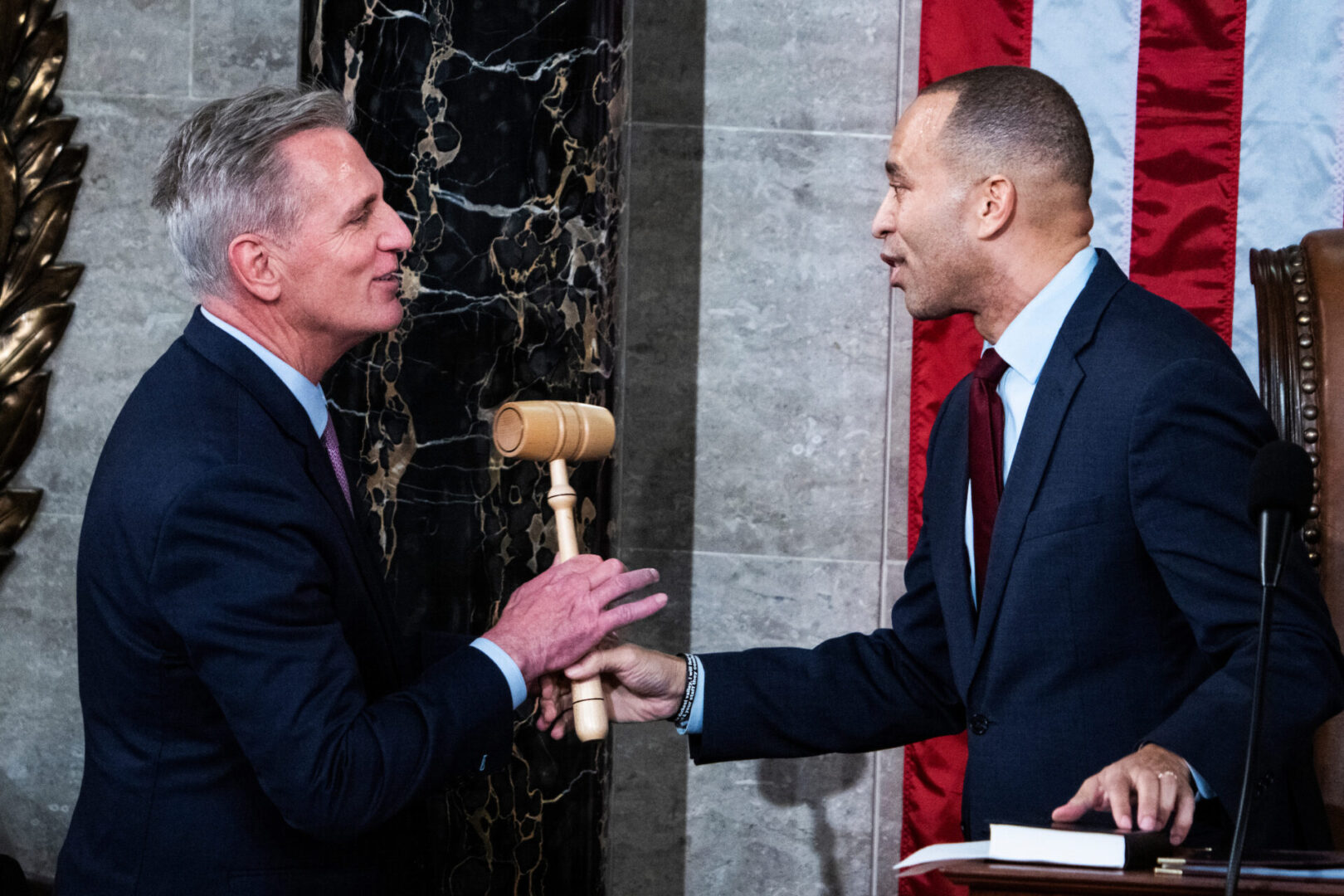Speaker Kevin McCarthy, R-Calif., accepts the gavel from Minority Leader Hakeem Jeffries, D-N.Y., after McCarthy won the speakership on the 15th ballot on Jan. 7. 