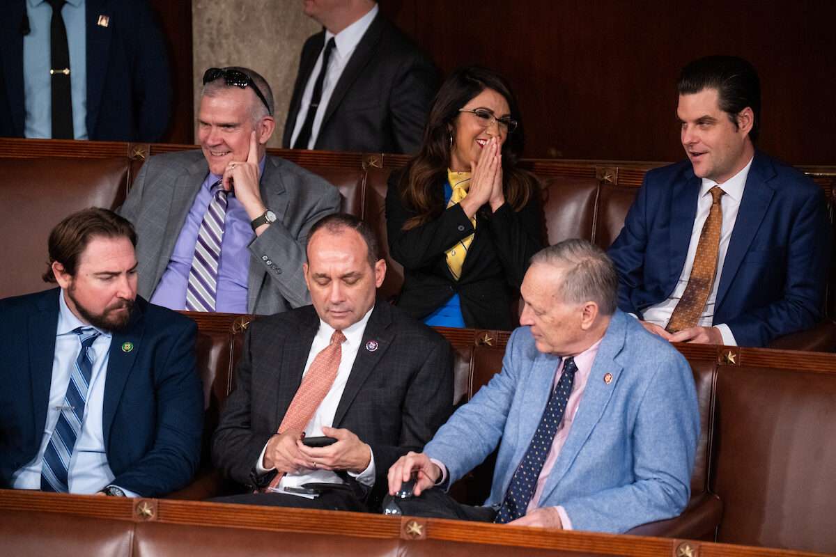 (From left) Reps. Eli Crane, R-Ariz., Matt Rosendale, R-Mont., Bob Good, R-Va., Lauren Boebert, R-Colo., Andy Biggs, R-Ariz., and Matt Gaetz, R-Fla., sit together during a speaker vote on the House floor on Friday. 