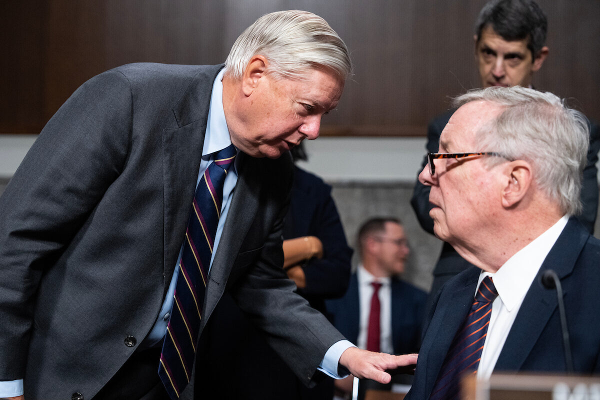 Ranking member Sen. Lindsey Graham, R-S.C., left, and Chairman Richard Durbin, D-Ill., arrive for a Senate Judiciary Committee markup on Thursday. Prior to the markup, they spoke to reporters about the nomination of former Rep. Matt Gaetz, R-Fla., to be attorney general.