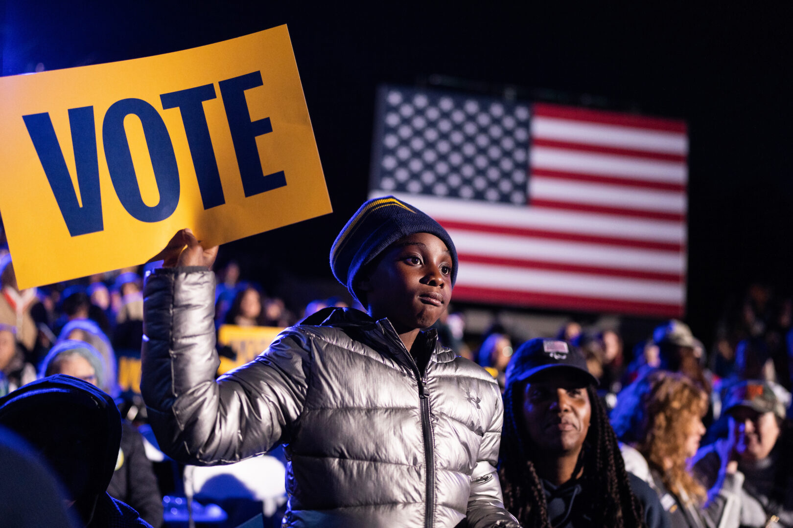 A child waits for Kamala Harris to take the stage during a rally in Ann Arbor, Mich., on Oct. 28.  