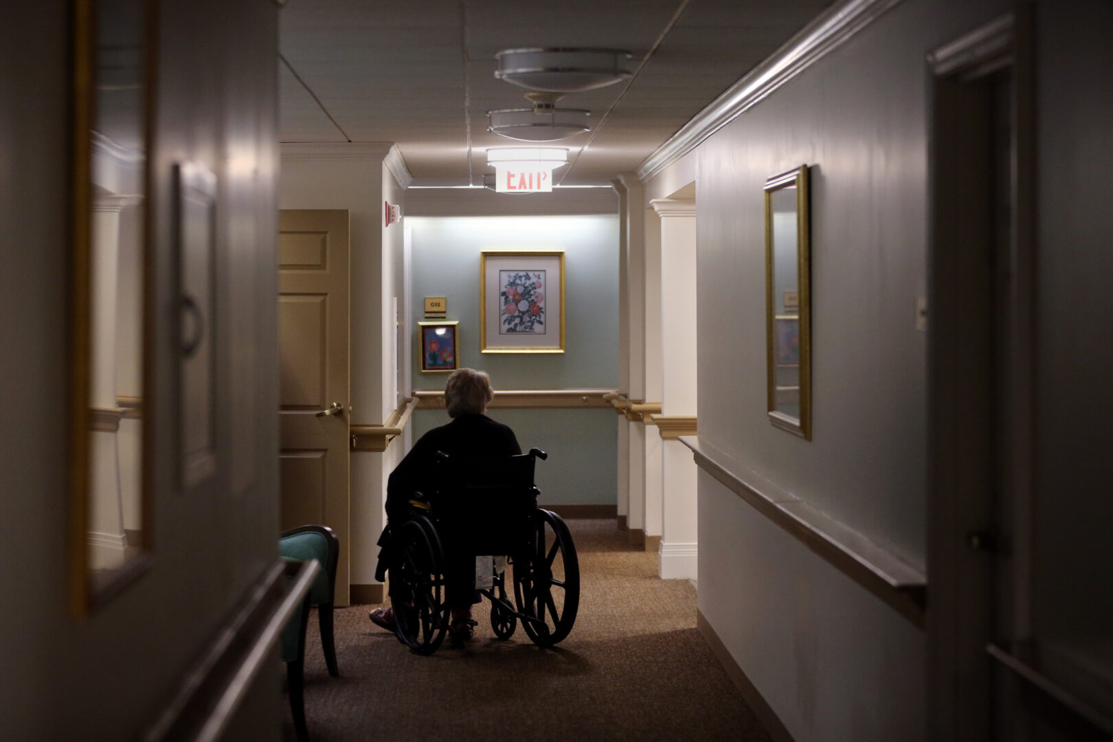 A resident in a wheelchair at an assisted living facility in Boston, MA in 2020. 
