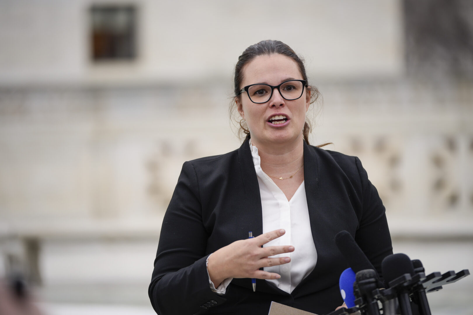 Allison Riggs, shown outside the U.S. Supreme Court in 2022, is battling to preserve her narrow victory in North Carolina's Supreme Court election. (Photo by Drew Angerer/Getty Images)