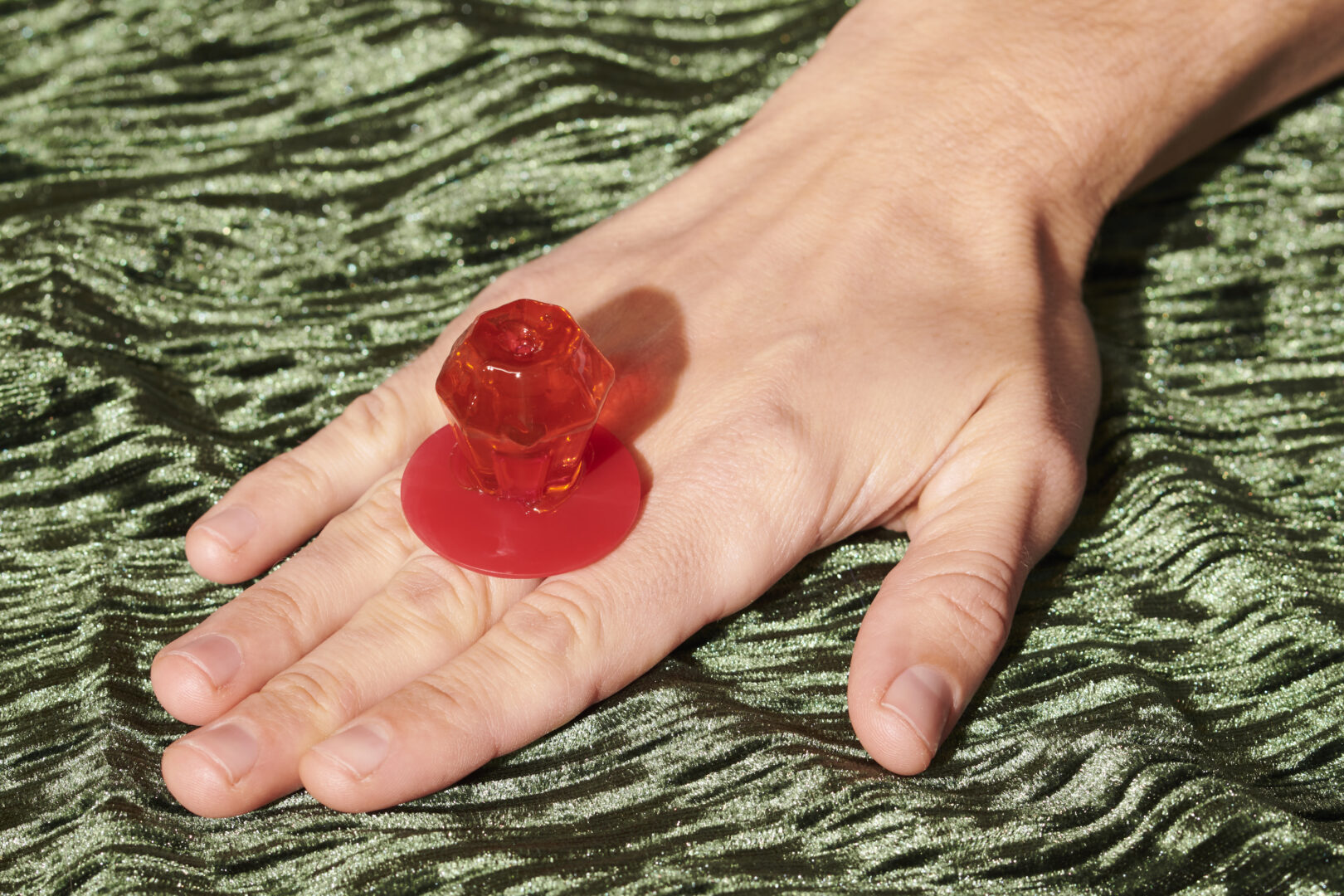 Red Dye No. 3 can have deleterious health effects. The ring is a strawberry Ring Pop (red no. 40 and red no. 3).