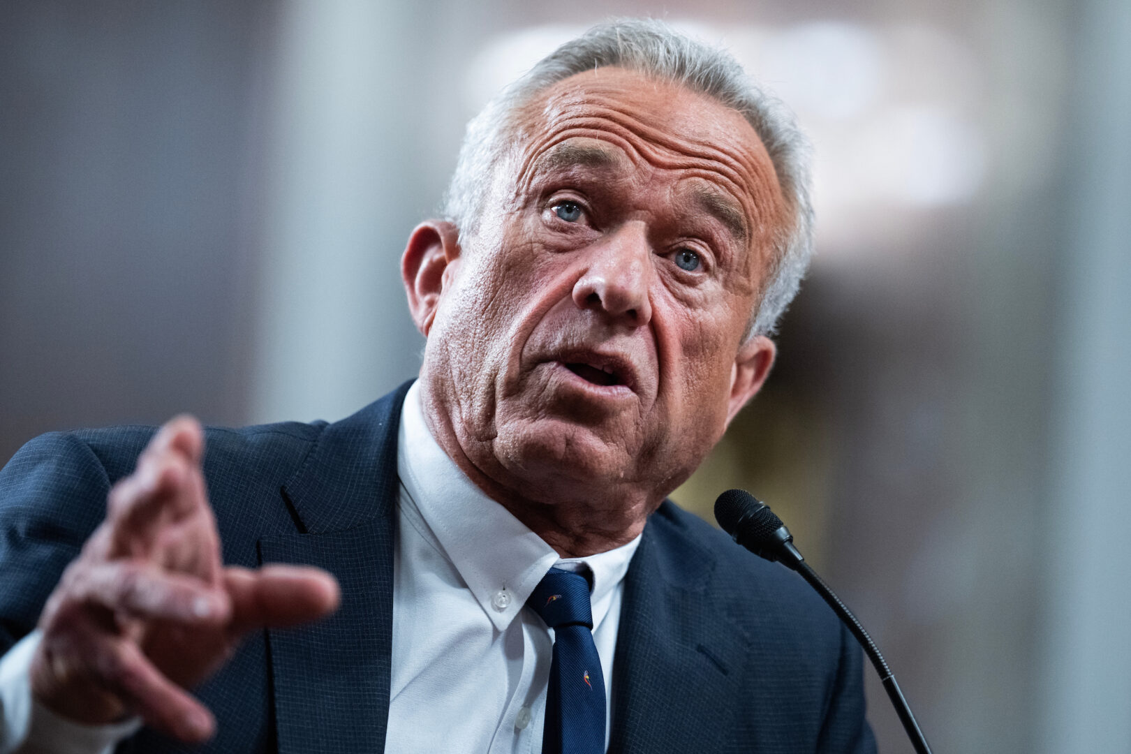Robert F. Kennedy Jr.,  President Donald Trump's nominee to be secretary of Health and Human Services, testifies at his Senate Finance Committee confirmation hearing Wednesday. 