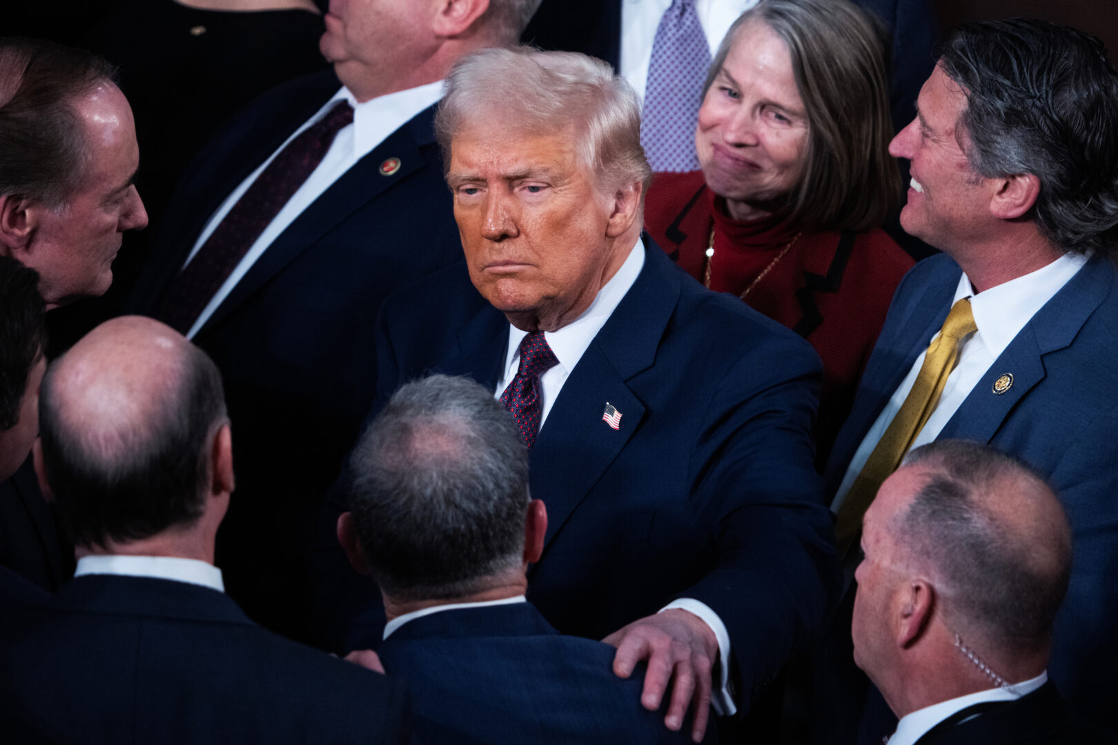 President Donald Trump greets members after addressing a joint session of Congress in the House Chamber of the U.S. Capitol on Tuesday, March 4, 2025. 