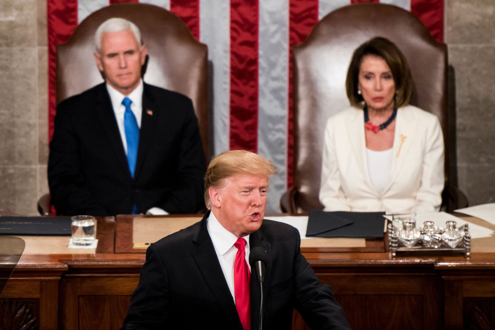 With Vice President Mike Pence and Speaker Nancy Pelosi behind him, President Donald Trump delivers his 2019 State of the Union address, in which he vowed to end HIV in the United States by 2030.