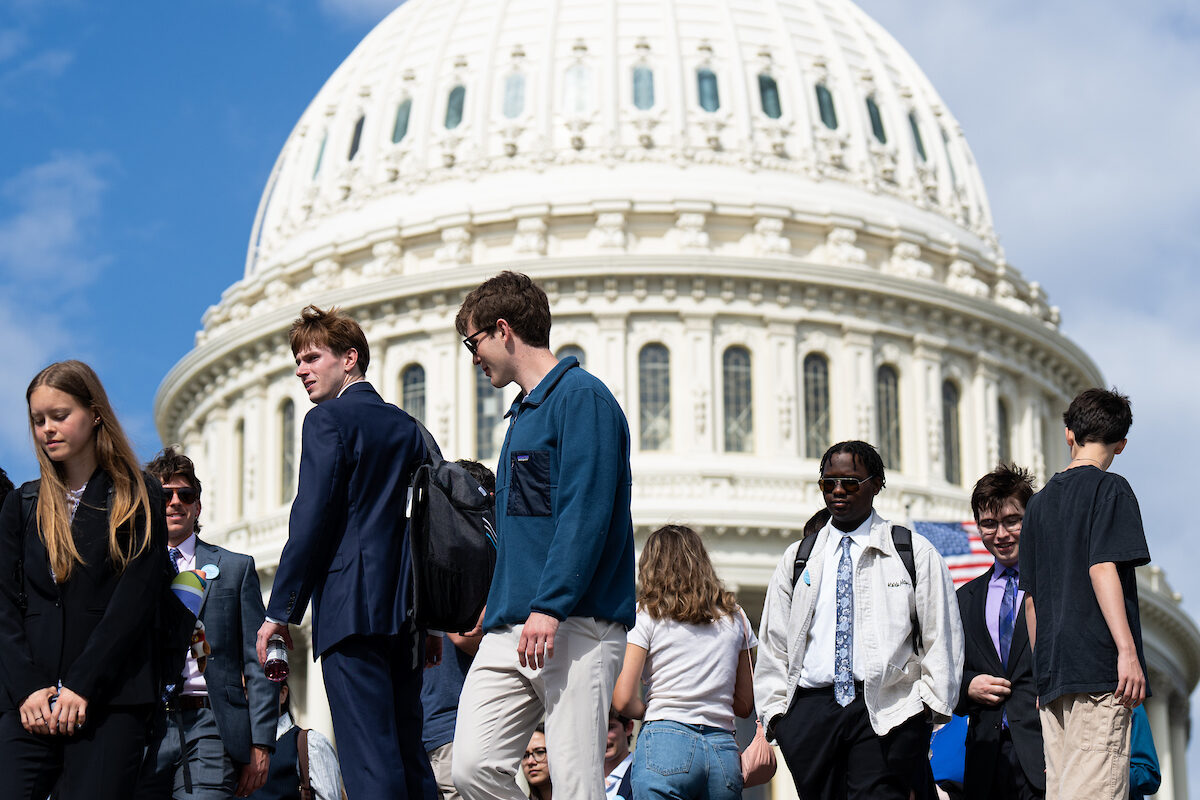 Negative views of Congress has not kept tourists away from the Capitol, like these seen visiting on Monday. 