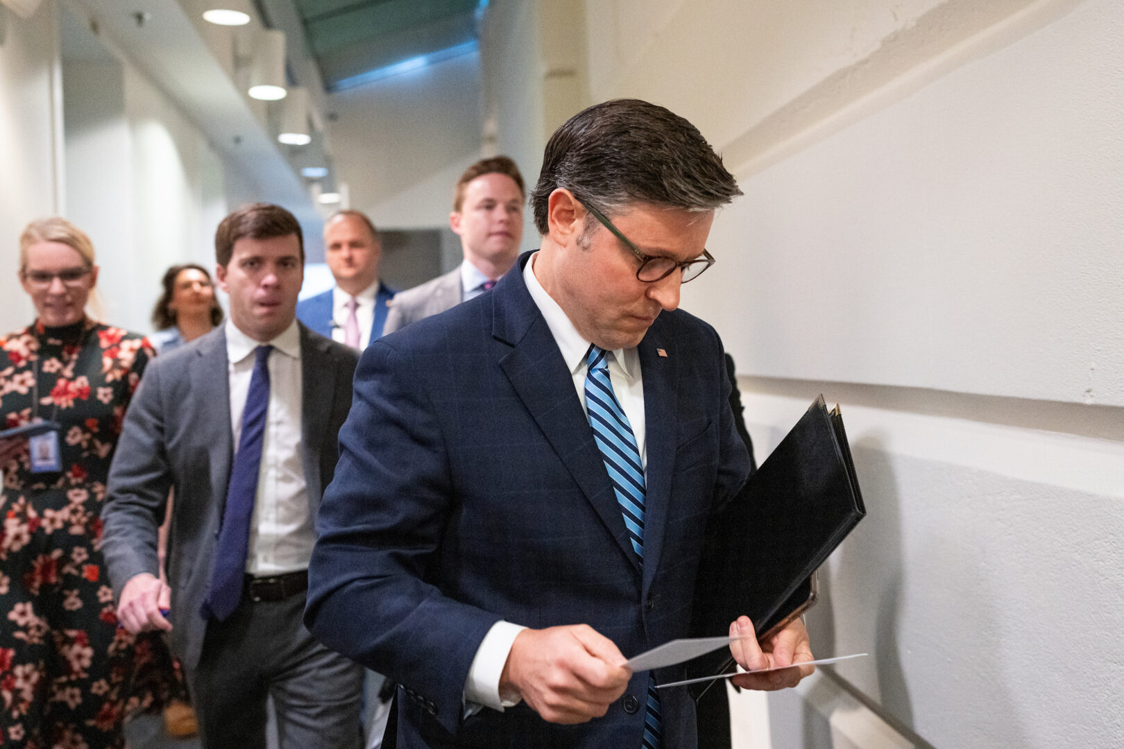 Speaker Mike Johnson, seen here arriving for a House Republican Conference meeting in the Capitol on Wednesday, publicly threw his weight behind a push to ban congressional stock trading. 
