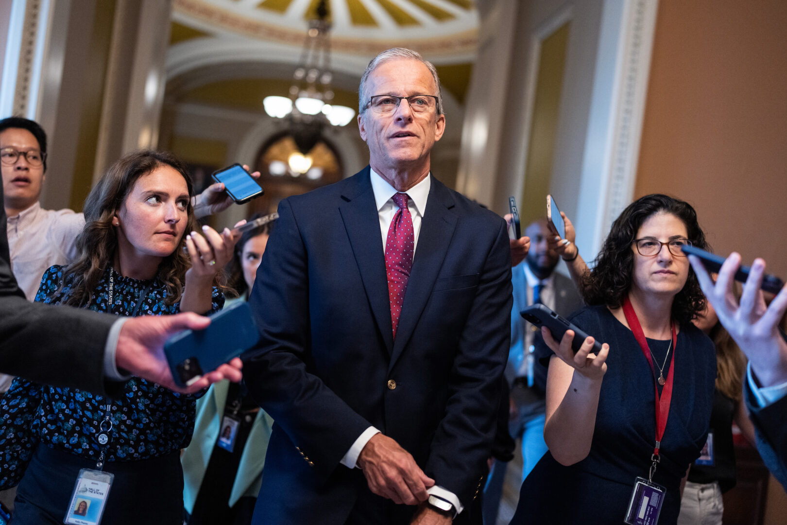 Senate Majority Leader John Thune, R-S.D., talks with reporters in the Capitol after House Republicans passed their version of the “one big, beautiful” bill on May 22. Now senators must grapple with the crush of health care costs, the specter of inflation and more, Winston writes. 