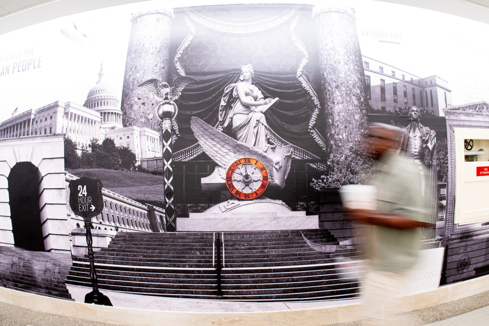 Work is underway to replace the mural near the Longworth House Office Building cafeteria on Monday.
