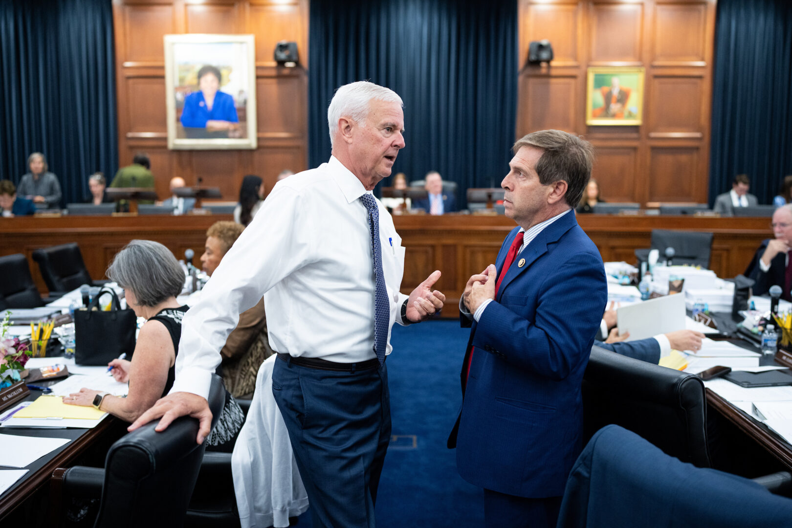 Reps. Steve Womack, R-Ark., and Chuck Fleischmann, R-Tenn., talk before the start of a House Appropriations Committee markup on July 10, 2024. 