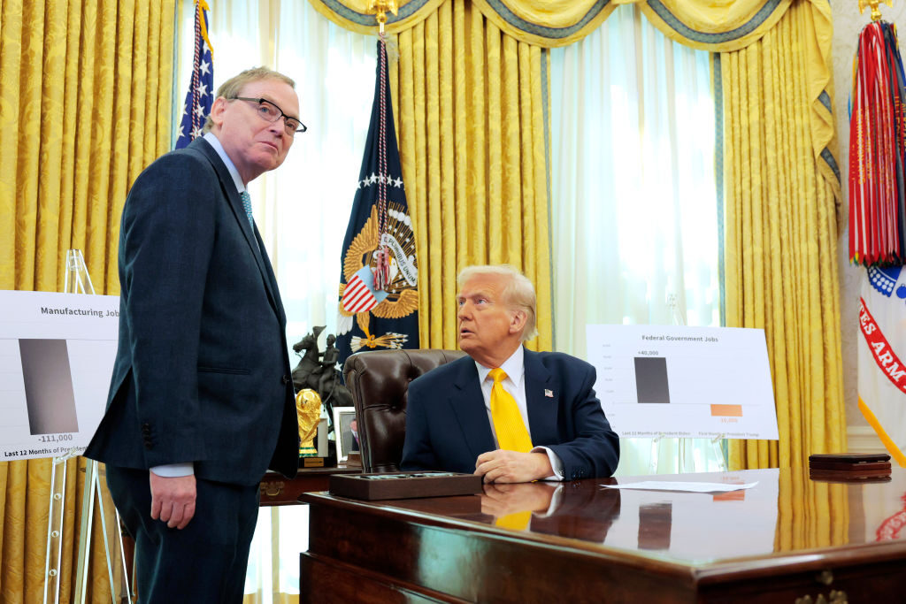 Economic advisers like Kevin Hassett have defended Donald Trump after he summarily fired the leader of the Bureau of Labor Statistics. Above, Hassett and Trump are seen in the Oval Office in March.