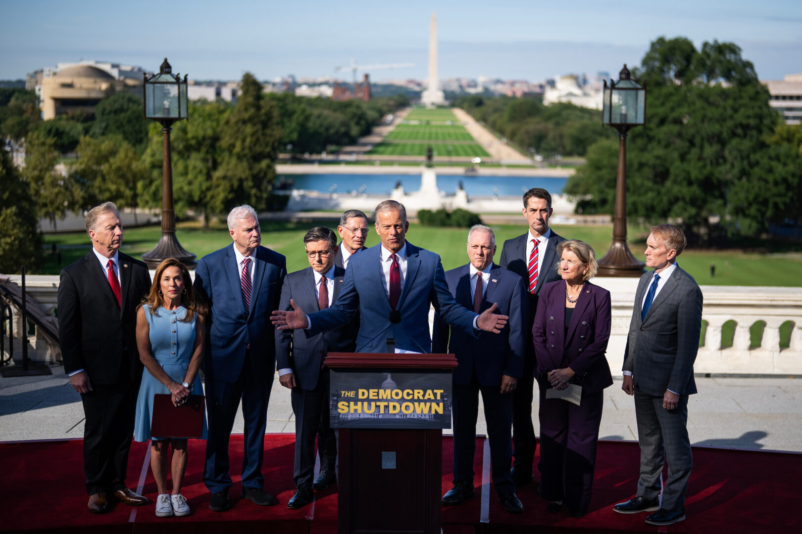 Senate Majority Leader John Thune speaks during a news conference about the government shutdown on Wednesday. Also attending are, from left, GOP Rep. Kevin Hern, House Republican Conference Chair Lisa McClain, House Majority Whip Tom Emmer, Speaker Mike Johnson, Senate Majority Whip John Barrasso, House Majority Leader Steve Scalise, Senate Republican Conference Chair Tom Cotton and GOP Sens. Shelley Moore Capito and James Lankford.

