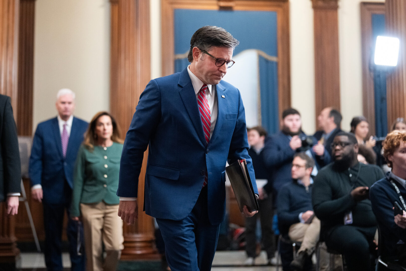Speaker Mike Johnson, R-La., arrives for a news conference in the U.S. Capitol on the eighth day of the government shutdown on Wednesday, Oct. 8, 2025. 