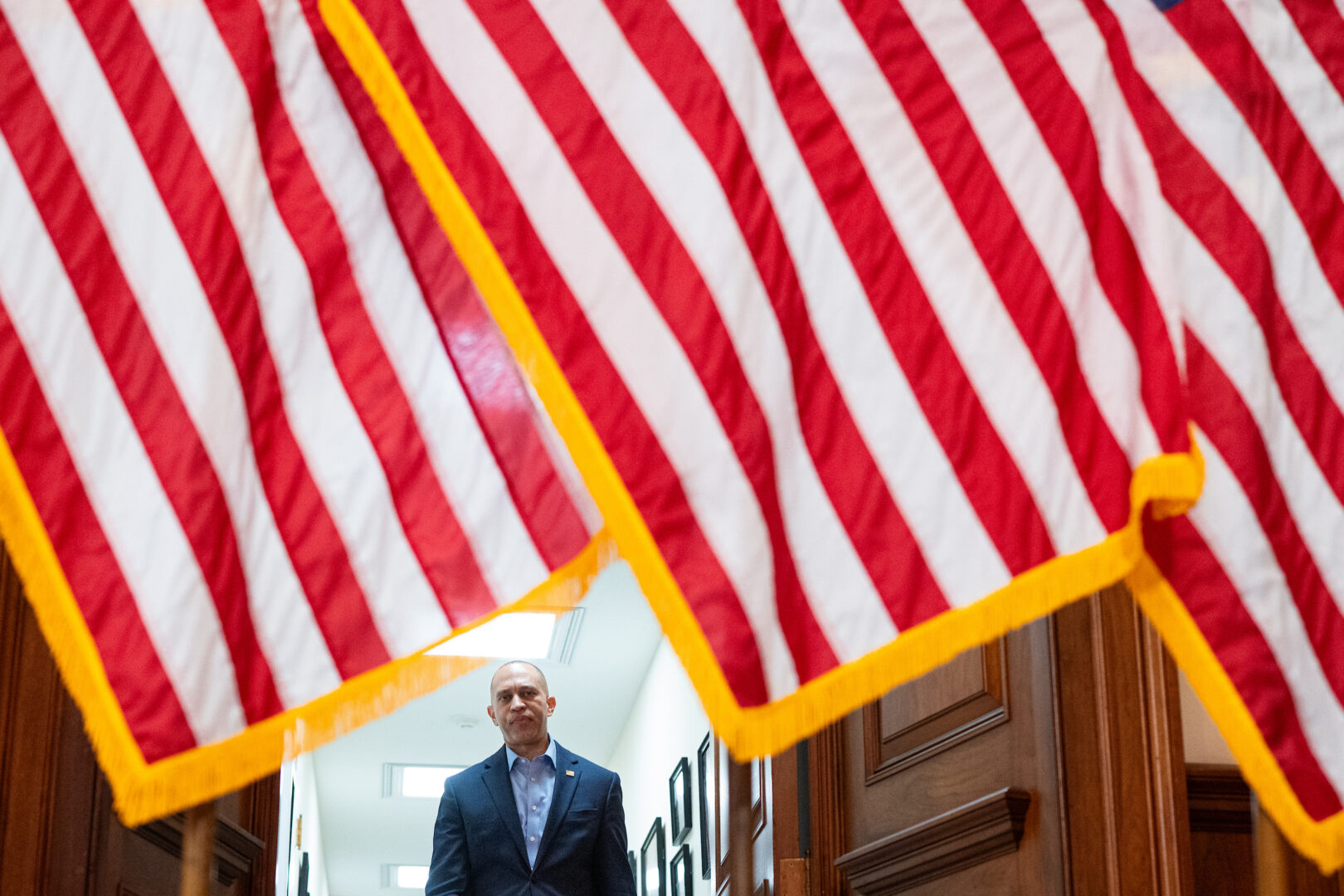 House Minority Leader Hakeem Jeffries, D-N.Y., walks from his office to the microphone to hold a news conference on the government shutdown in the U.S. Capitol on Tuesday, Oct. 21, 2025. 