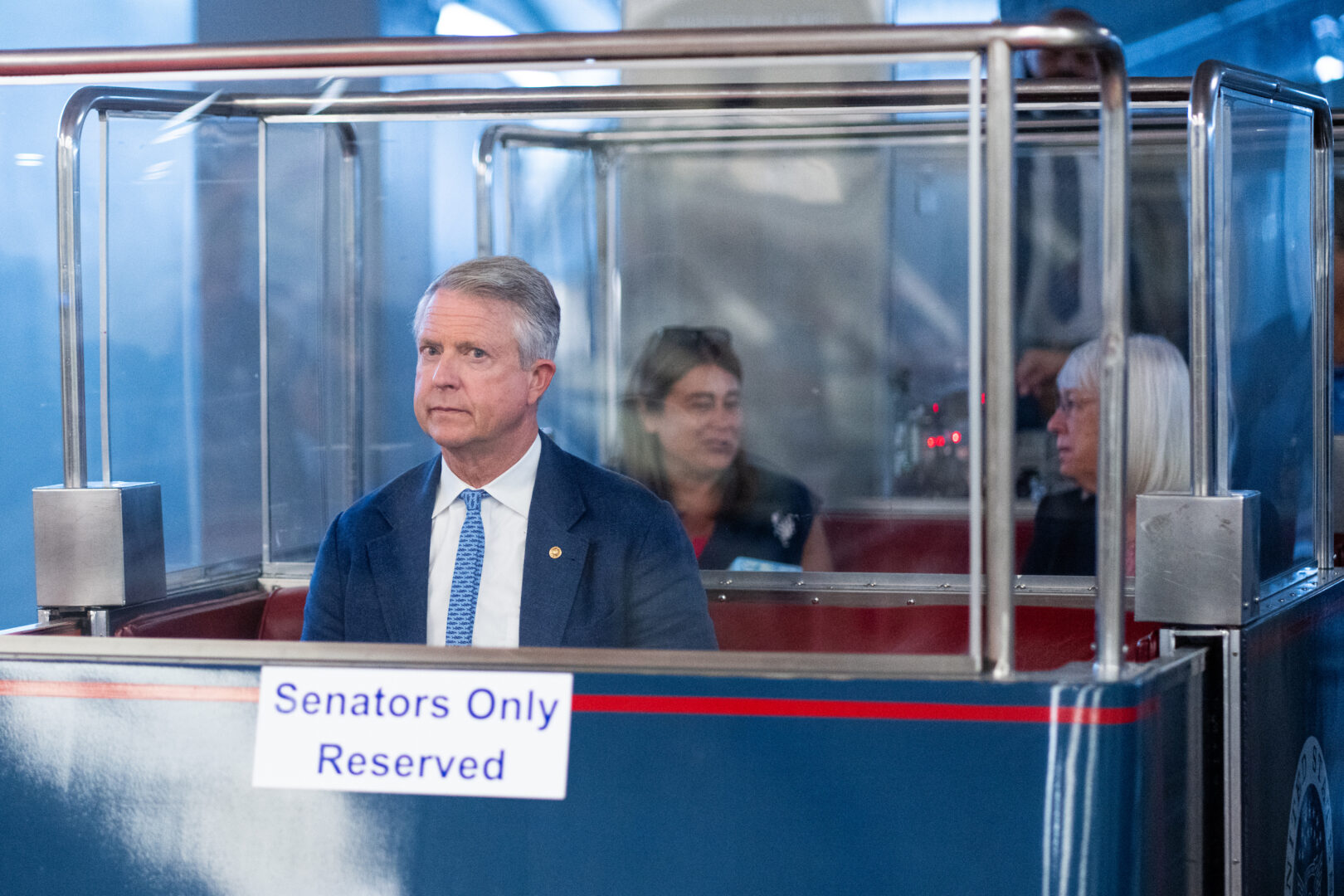Sens. Roger Marshall and Patty Murray arrive on the Senate subway for a vote in the Capitol on July 15.