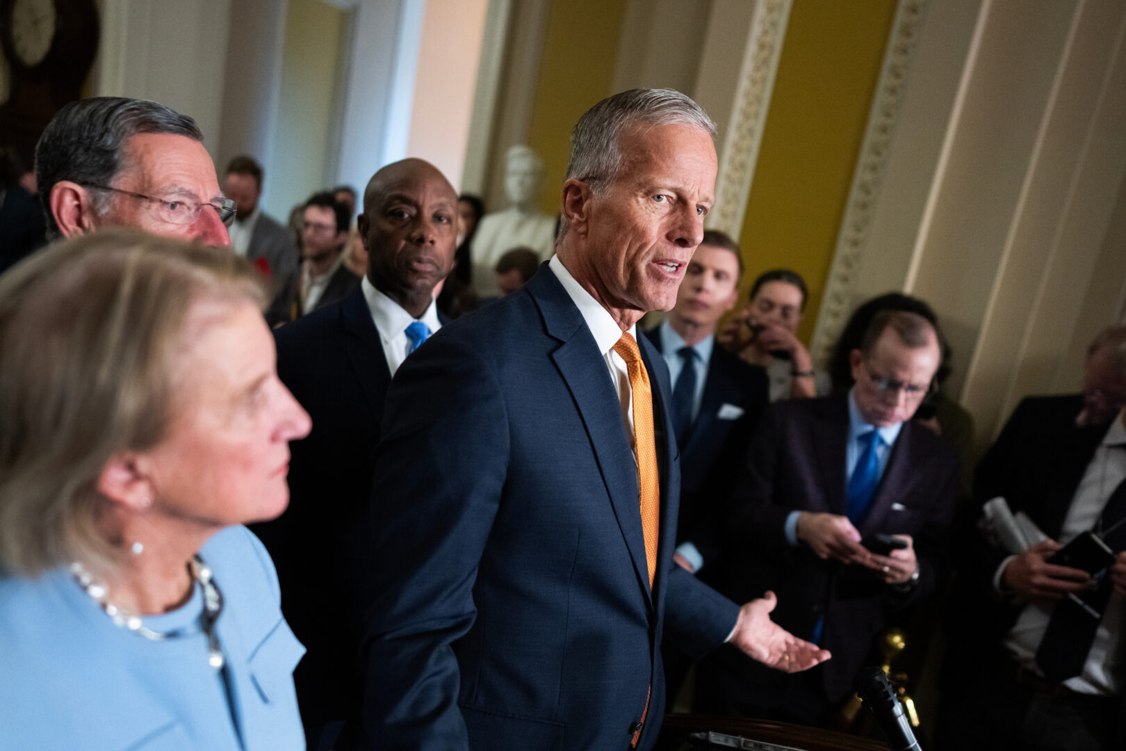 Senate Majority Leader John Thune, R-S.D., was delayed in leaving Washington for the weekend because of a shutdown-related airport delay. Thune is shown speaking to reporters Tuesday, along with, from left, Sen. Shelley Moore Capito, R-W.Va., Majority Whip John Barrasso, R-Wyo., and Sen. Tim Scott, R-S.C.