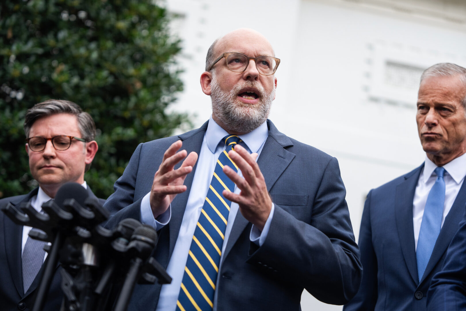 Office of Management and Budget Director Russ Vought, center, at the White House on Sept. 29. 