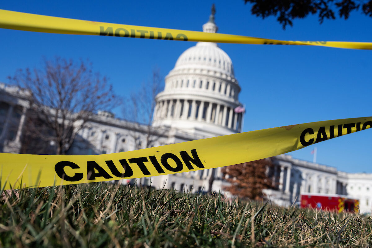 Caution tape is seen on the East Front lawn of the U.S. Capitol on Dec. 18. In 2025, Congress faced questions about its role in government as the executive and judicial branches tugged at its responsibilities.