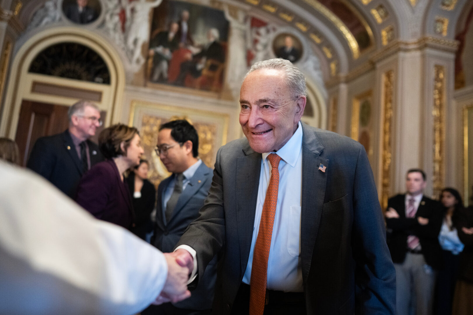 Senate Minority Leader Charles E. Schumer, D-N.Y., arrives at the Capitol on Wednesday for a news conference to urge the Senate to extend Affordable Care Act tax credits.