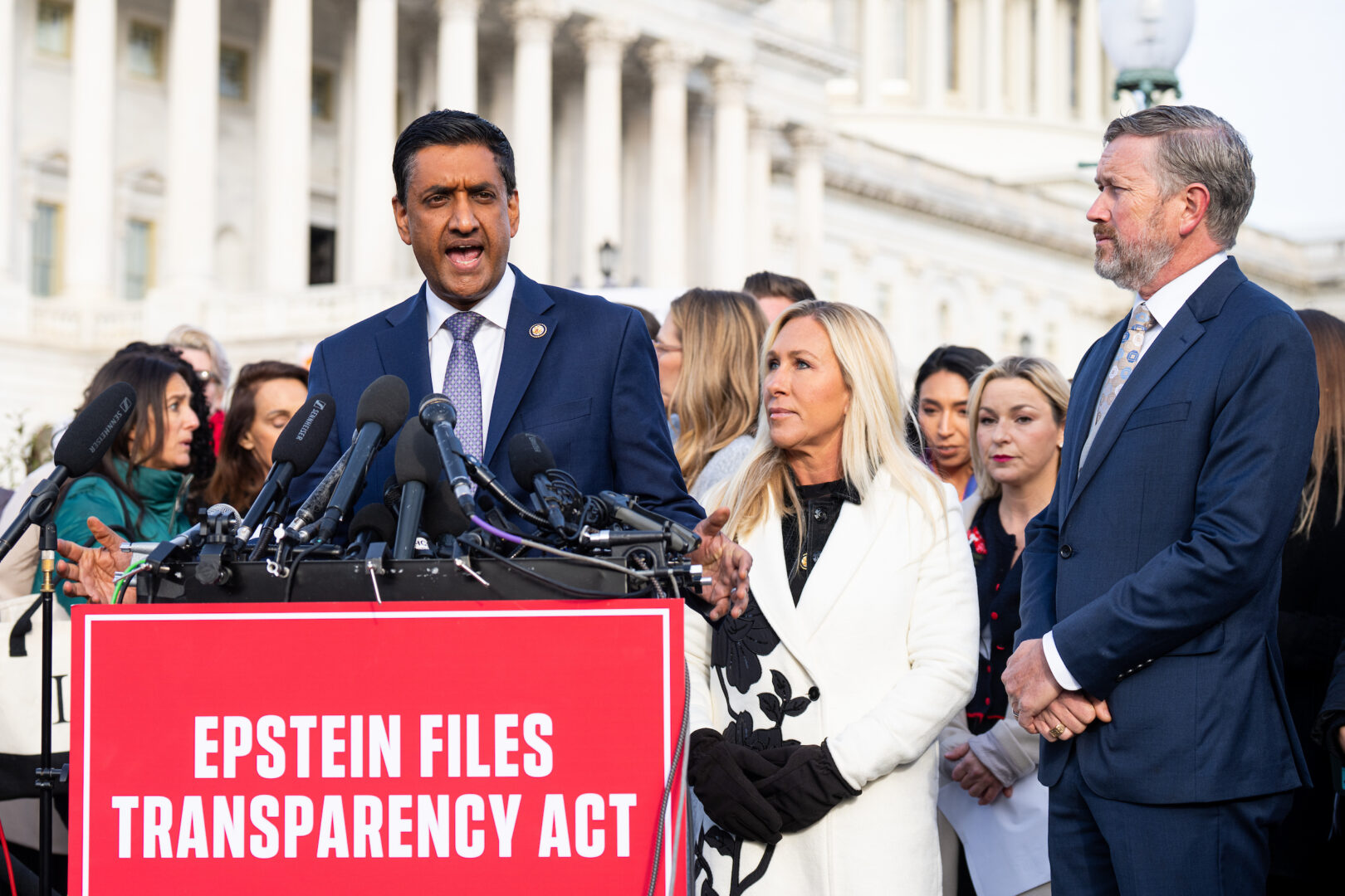 From left, Rep. Ro Khanna, D-Calif., Rep. Marjorie Taylor Greene, R-Ga., and Rep. Thomas Massie, R-Ky., hold their news conference with survivors of convicted sex offender Jeffrey Epstein in November outside the Capitol. 