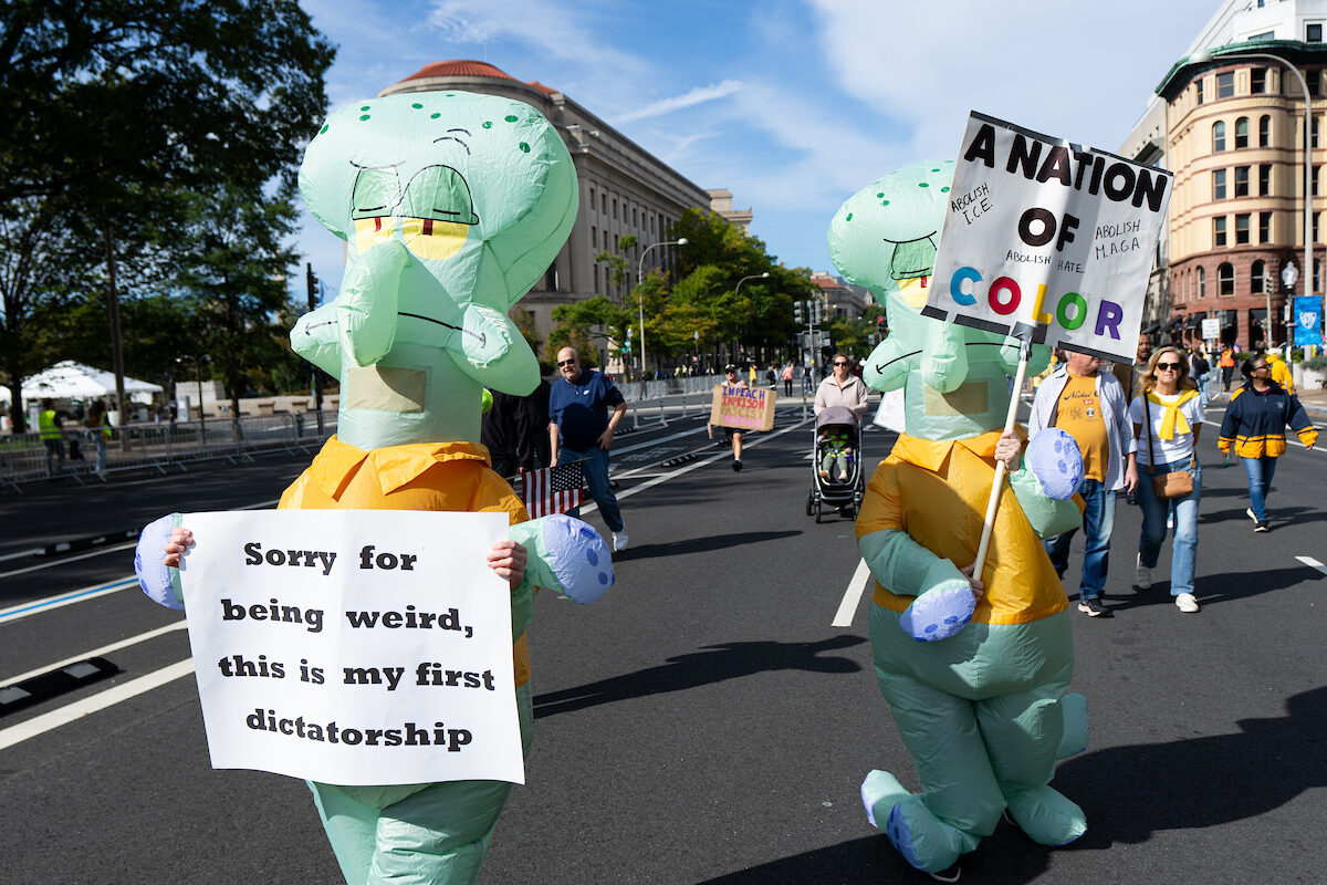 Protesters march down Pennsylvania Avenue NW for the second "No Kings" protest  in Washington on Oct. 18, 2025. The current political instability has some parallels to the 1930s portrayed in Thomas Pynchon's novel "Shadow Ticket."
