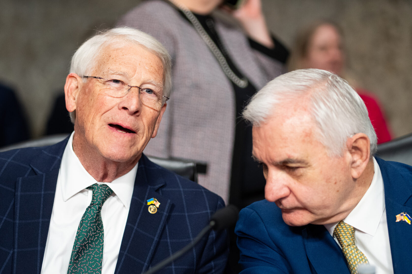From left, Chairman Roger Wicker, R-Miss., and ranking member Jack Reed, D-R.I., talk before the start of the Senate Armed Services Committee hearing on Dec. 11, 2025. 