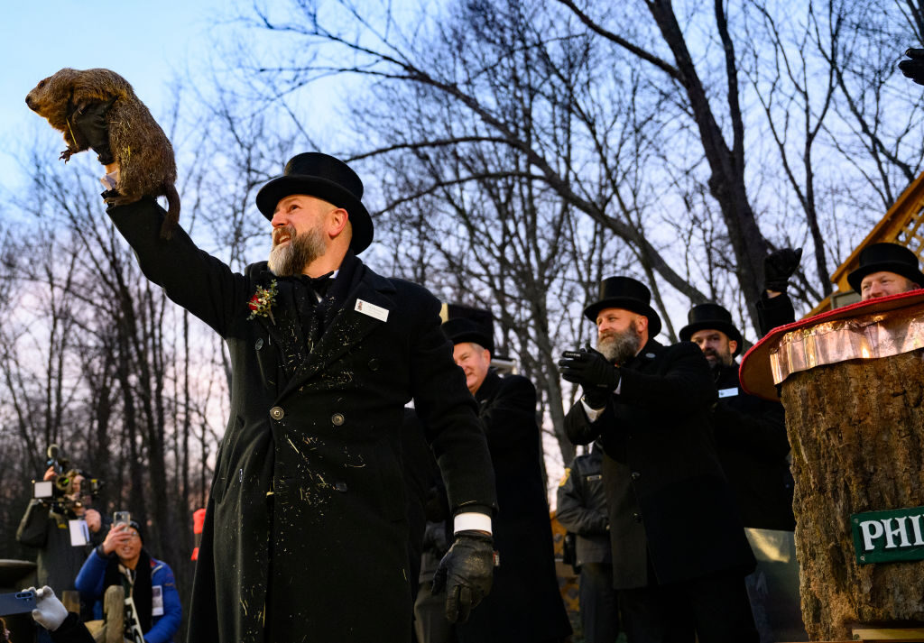 A groundhog handler holds Punxsutawney Phil after he saw his shadow during last year’s  Groundhog Day festivities in Pennsylvania. Democrats should heed the lessons of recent polling and be wary of another government shutdown, Winston writes.