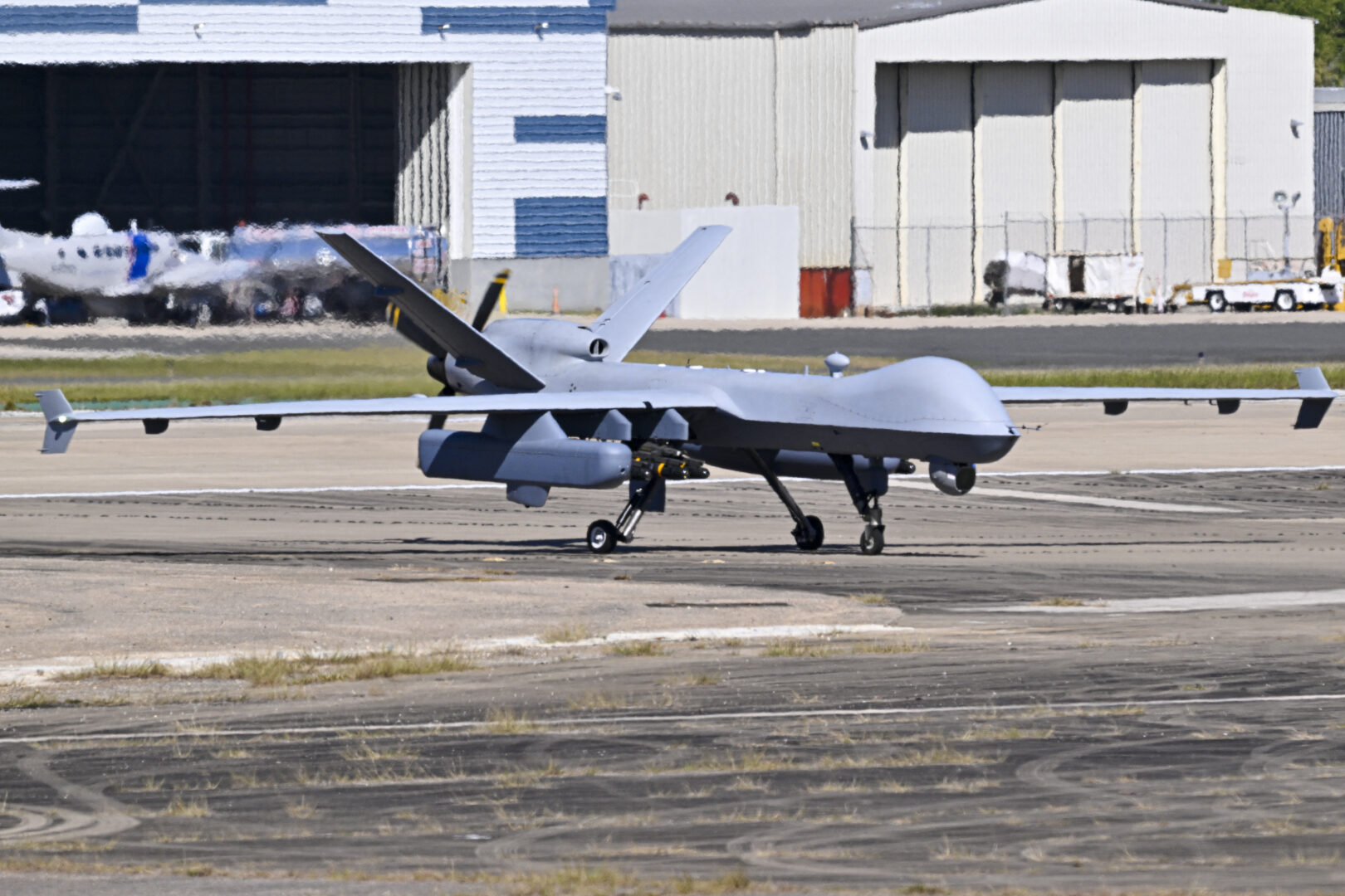 A U.S. military MQ-9 Reaper drone taxis on a tarmac at Rafael Hernandez Airport in Aguadilla, Puerto Rico, on Dec. 29, 2025. Since September, U.S. forces have launched dozens of airstrikes on boats accused of trafficking drugs.