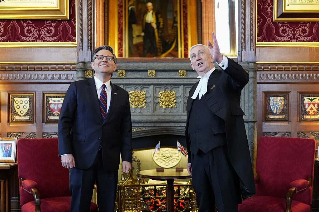 Britain's Speaker of the House of Commons Lindsay Hoyle gestures as he speaks with U.S. House Speaker Mike Johnson, R-La., during his visit to the House of Commons on Monday.