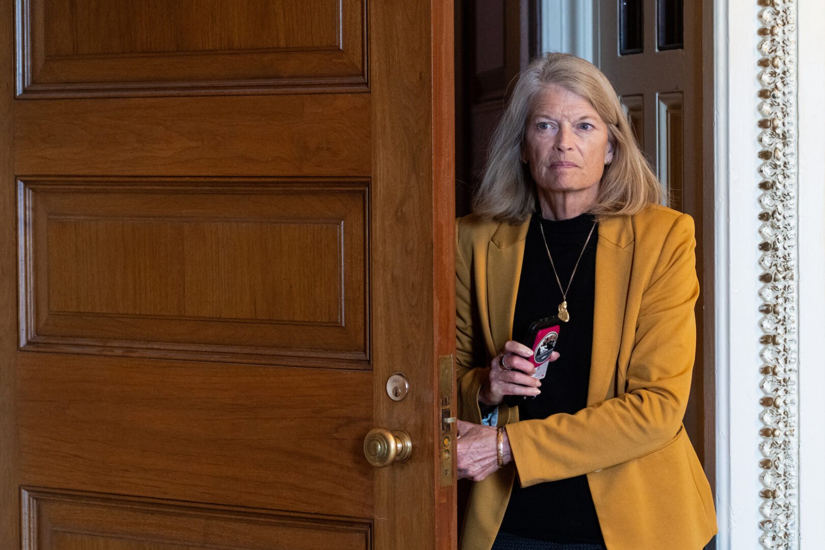 Sen. Lisa Murkowski, R-Alaska, seen in the Capitol on Tuesday, says she has not given up seeking a compromise on extension of health insurance subsidies. (Bill Clark/CQ Roll Call)