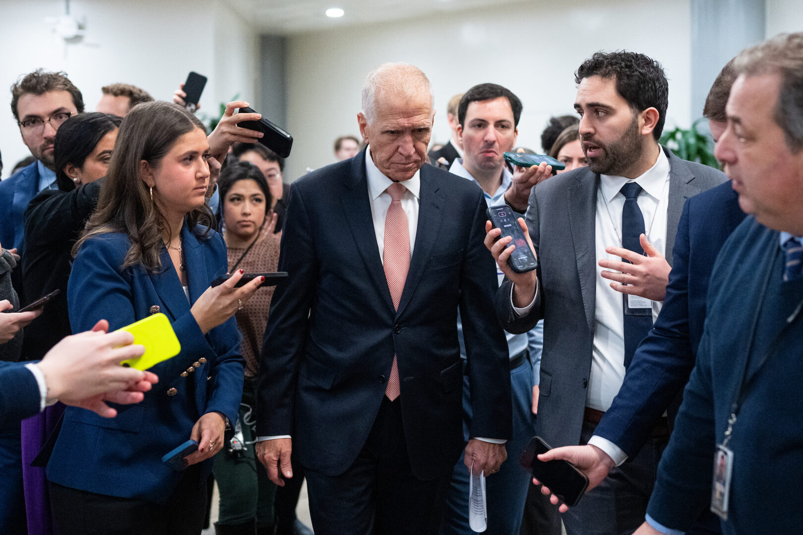 Sen. Thom Tillis, R-N.C., speaks to reporters in the Senate subway on Thursday.