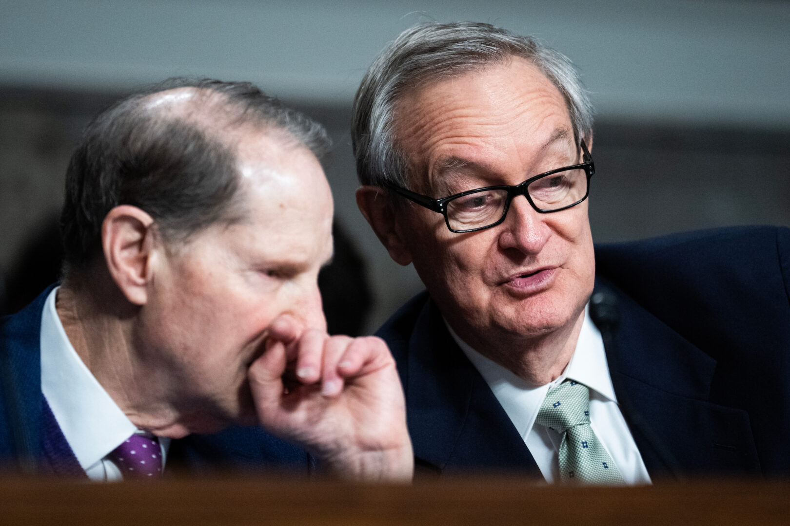 Chairman Michael D. Crapo, R-Idaho, right, and ranking member Sen. Ron Wyden, D-Ore., are seen at a Senate Finance Committee hearing in the Dirksen Senate Office Building. 