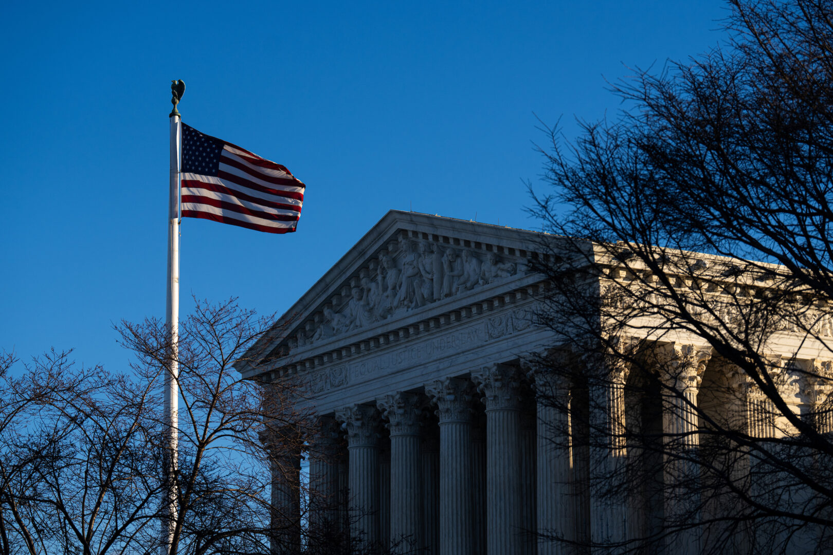 The American flag flies in front of the Supreme Court in Washington last month. 