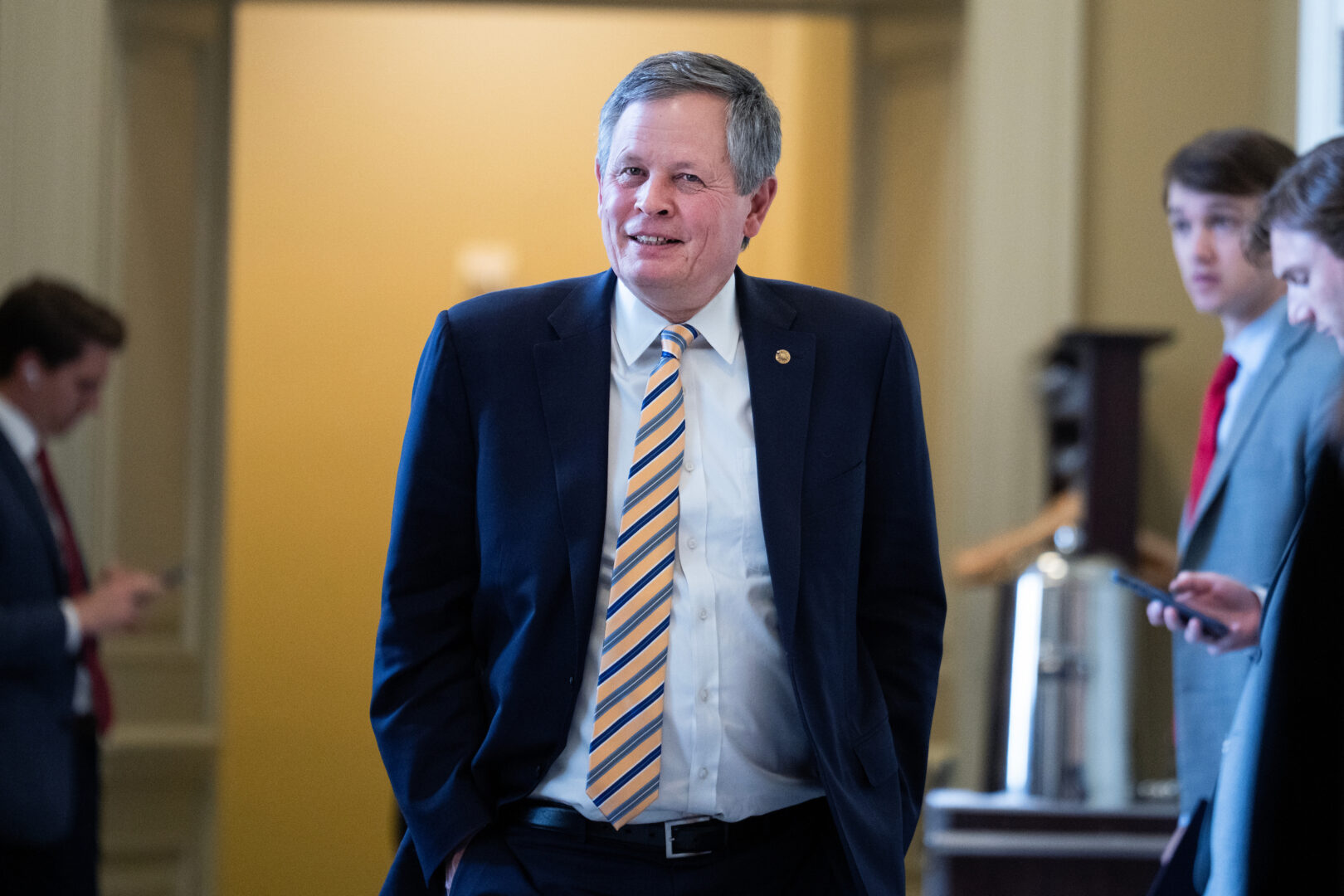 Sen. Steve Daines, R-Mont., leaves the Republican Senate luncheon in the U.S. Capitol on Tuesday, July 22, 2025. 