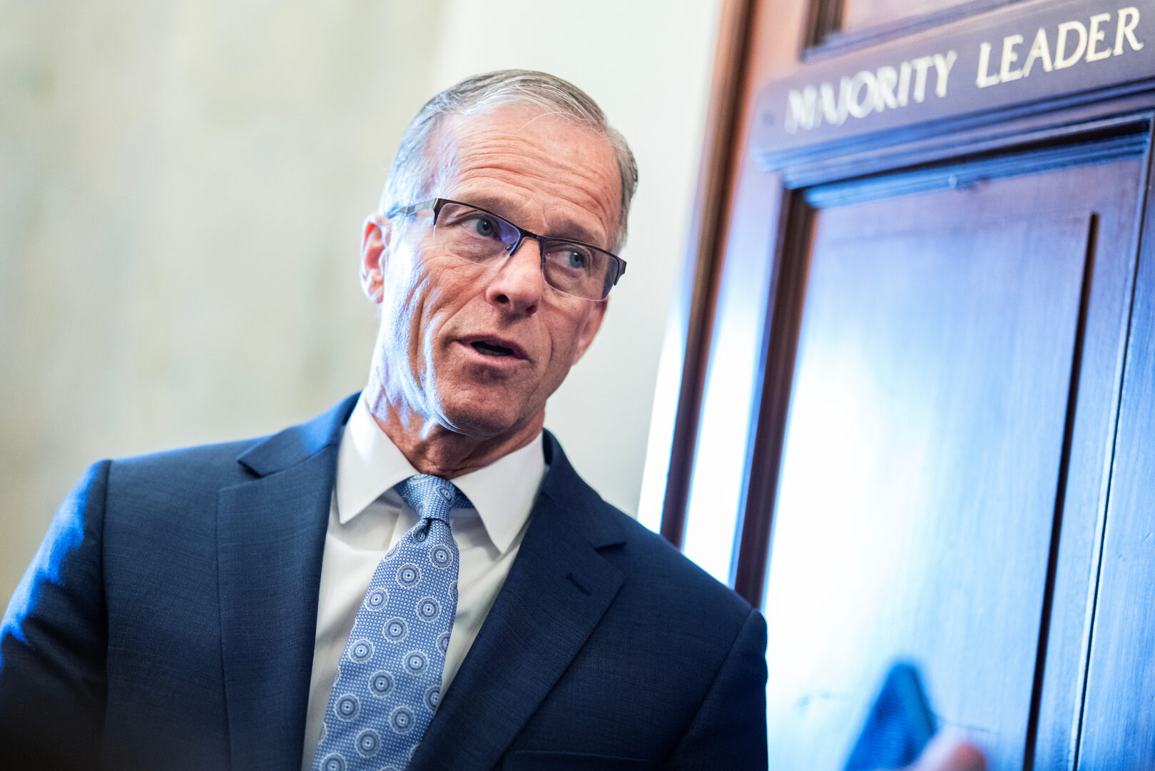 Senate Majority Leader John Thune, R-S.D., talks with reporters in the  Capitol on Jan. 29. 