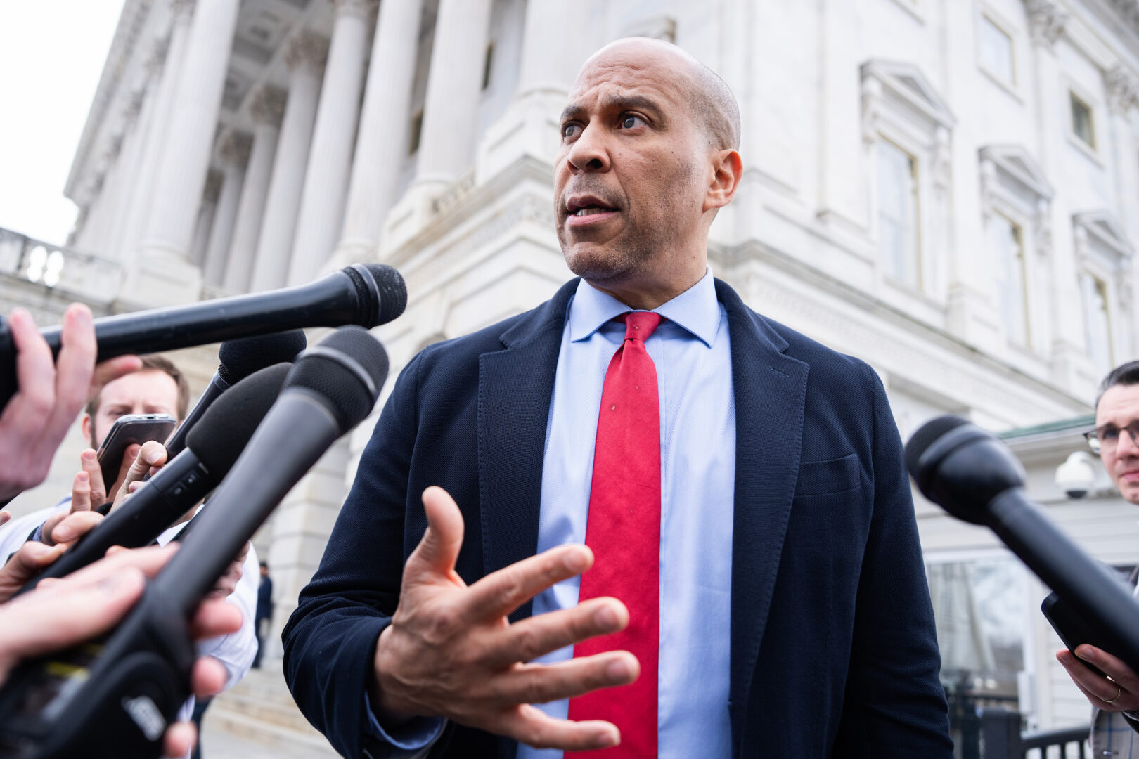 Sen. Cory Booker, D-N.J., talks with reporters outside the Capitol on March 5.