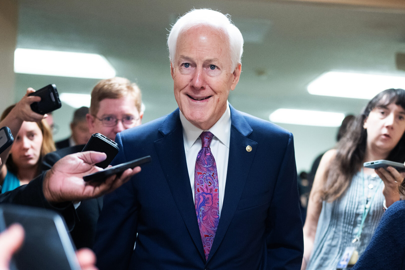 Sen. John Cornyn, R-Texas, talks with reporters in the U.S. Capitol during votes on Tuesday, March 10, 2026. 