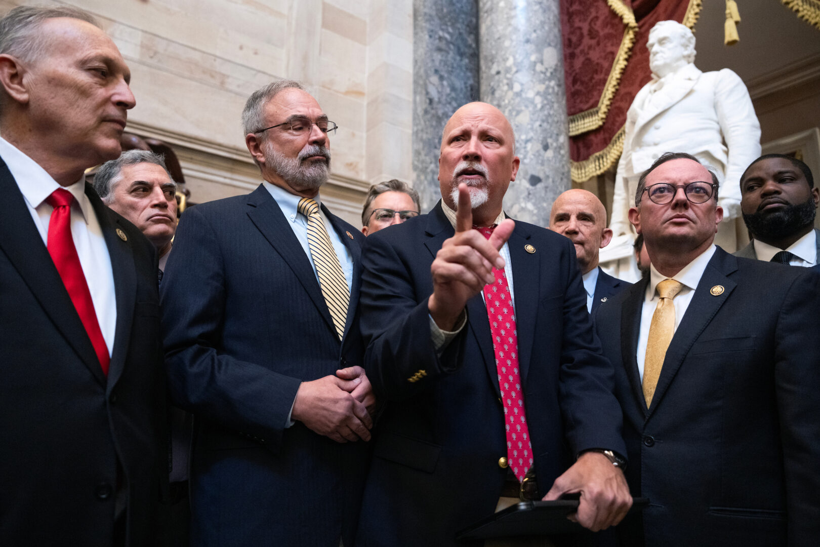 Members of the House Freedom Caucus conduct a news conference to say they will not support the DHS funding bill in its current form, in the U.S. Capitol’s Statuary Hall on Friday. 