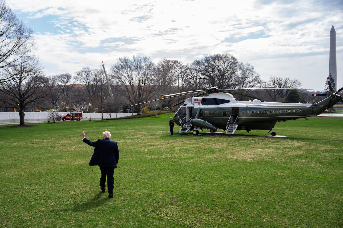 President Donald Trump walks to Marine One on the South Lawn of the White House on March 11. (Tom Williams/CQ Roll Call)