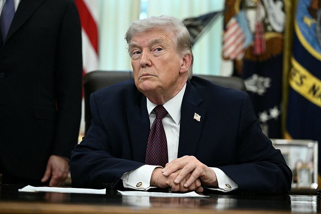 President Donald Trump takes a question from a reporter Tuesday in the Oval Office. (Brendan Smialowski/AFP via Getty Images)