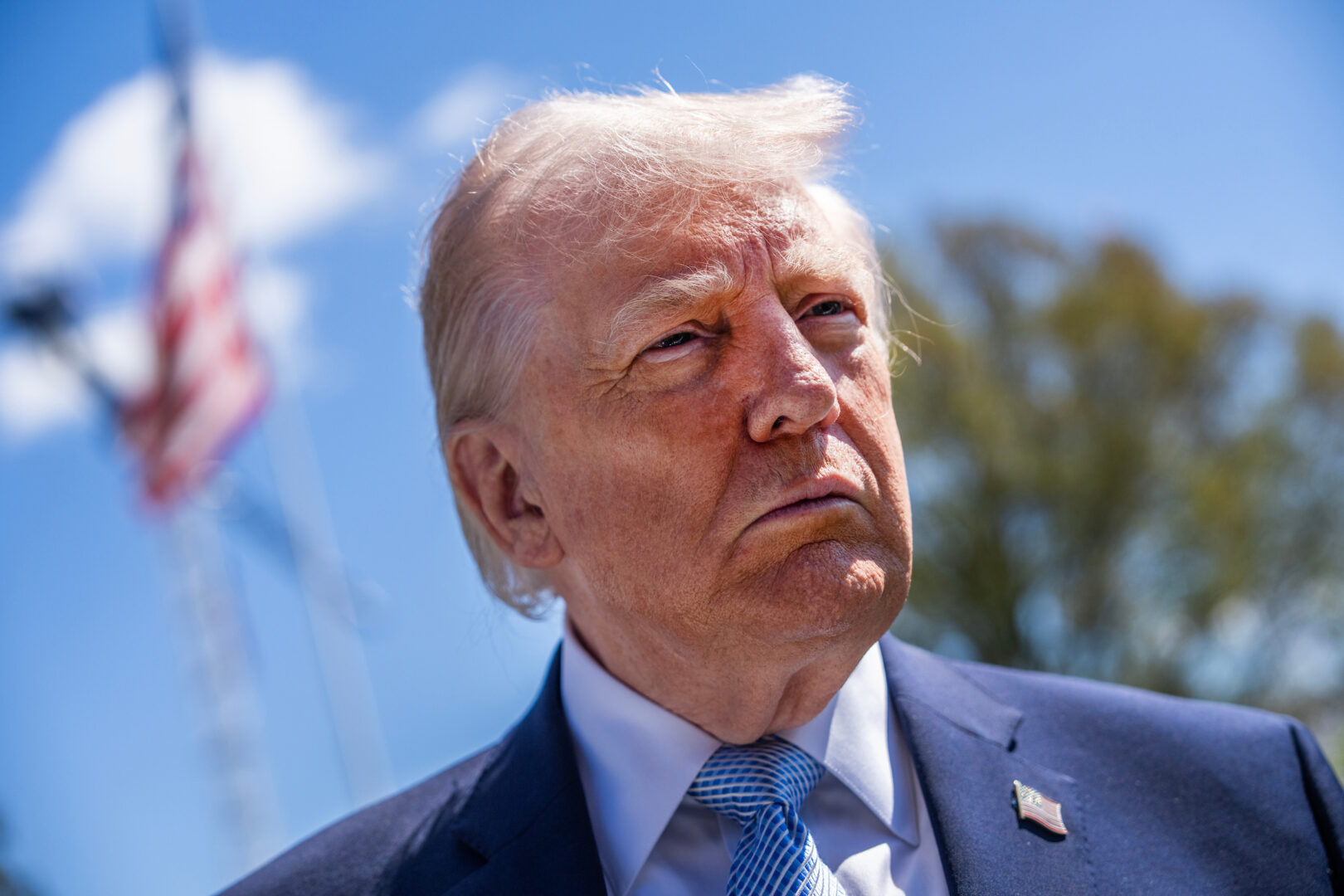 President Donald Trump talks with reporters on the South Lawn of the White House on April 6, 2026. 